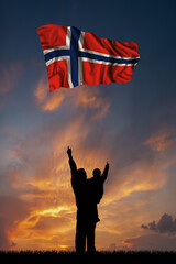 Father with son and the flag of Norway