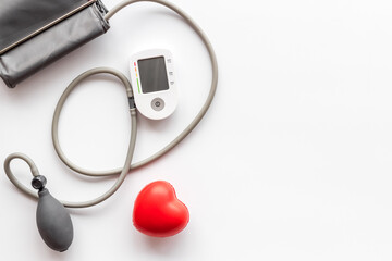 Heart attack risk. Checking blood pressure and heart rate by medical tonometer