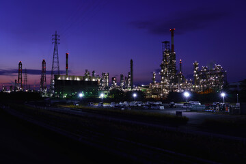Fototapeta na wymiar The petrochemical complex at Yokkaichi Port, Yokkaichi city, Mie prefecture, Japan at magic hour. 