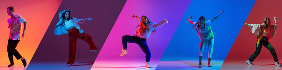 Music in moves. Young expressive contemp dance dancers dancing in neon light. Concept of dance, youth, hobby, dynamics, movement, action, ad. Banner with copy space
