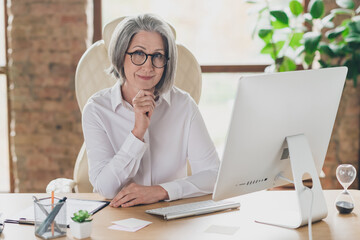 Photo of charming intelligent lady assistant dressed white shirt waiting new tasks modern device...