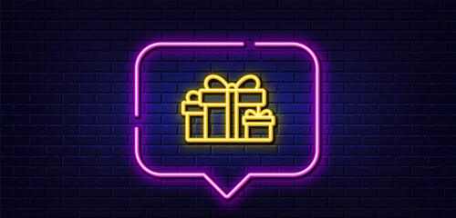 Neon light speech bubble. Gift boxes line icon. Present or Sale sign. Birthday Shopping symbol. Package in Gift Wrap. Neon light background. Holiday presents glow line. Brick wall banner. Vector