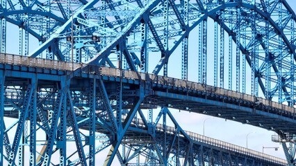 Naklejka premium Transportation and travel across South Grand Island Bridge over Niagara River near Buffalo, New York beautiful architecture and engineering with blue sky