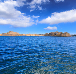 Grand Harbour seascape in Valletta, capital of Malta: view of Birgu, an old fortified city, with Fort Saint Angelo at its head and the city of Cospicua at its base. 