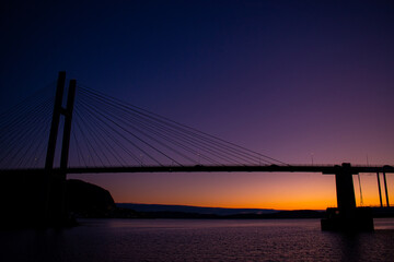 Fototapeta na wymiar Nordhordland Bridge at sunset in norway