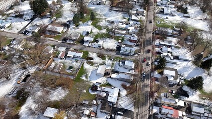 Small town house and streets in rural American countryside durn Winter with snow