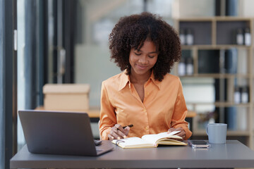 Accountant black woman working on laptop and do document, tax, exchange, accounting and Financial advisor concept