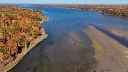 Irondequoit Bay, New York by Lake Ontario outside during Autumn Season with Fall colors on landscape