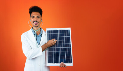 Black Young Doctor or Veterinarian Medical Resident With Stethoscope Holding Solar Panel Isolated
