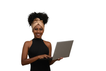 woman with laptop typing on keyboard looking at camera smiling, black woman