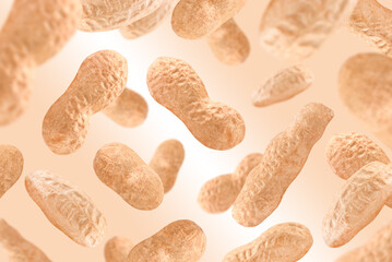 Levitation of peanuts on brown background.