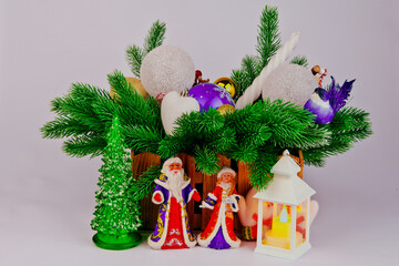 Gift basket for Christmas cards with Christmas tree toys, cones and accessories.Snow...