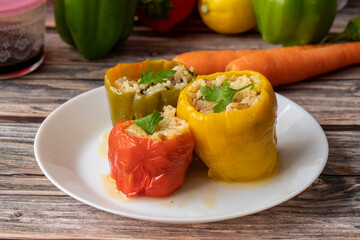 Stuffed peppers, colorful peppers stuffed with rice, top view. (Turkish name; stuffed peppers)