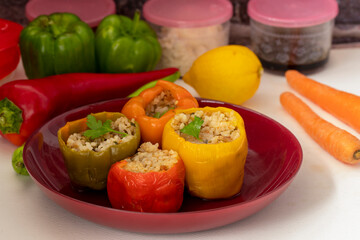 Stuffed peppers, colorful peppers stuffed with rice, top view. (Turkish name; stuffed peppers)