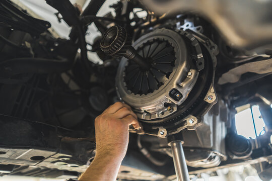 New clutch installation. Close-up. Repair shop concept. High quality photo