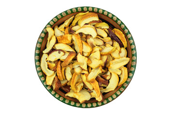 Dried apples in a clay plate isolated on a white background. Vegetarian organic foods. Top view.