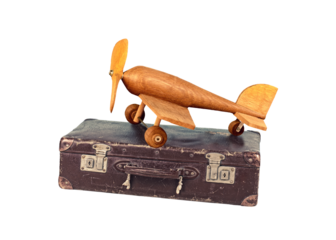 Reisen mit dem Flieger, Koffer und Flieger auf transparenten Hintergrund