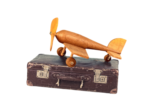 Reisen mit dem Flieger, Koffer und Flieger auf transparenten Hintergrund - Powered by Adobe