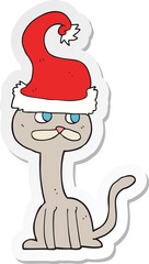sticker of a cartoon cat wearing christmas hat
