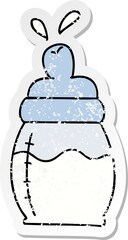 distressed sticker of a quirky hand drawn cartoon baby milk bottle