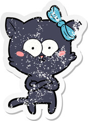 distressed sticker of a cartoon cat
