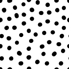 Seamless neutral polka dots pattern. Black hand-drawn circles isolated on white background. Abstract Random points ornament. Vector illustration for wallpaper, fabric, print, wrapping paper, textile