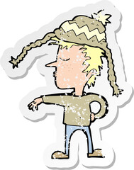 retro distressed sticker of a cartoon man wearing winter hat
