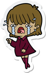 sticker of a cartoon girl crying