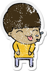 distressed sticker of a cartoon boy sticking out tongue