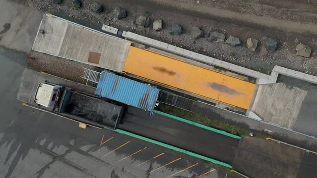 Aerial view of a dumper truck on a weighbridge