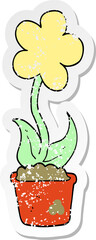 distressed sticker of a cute cartoon flower