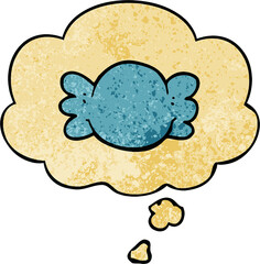 cartoon wrapped candy and thought bubble in grunge texture pattern style