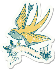 grunge sticker with banner of a swallow