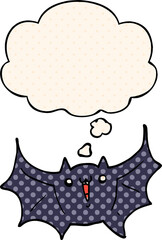 cartoon happy vampire bat and thought bubble in comic book style