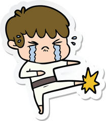 sticker of a cartoon boy crying