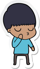 sticker of a cartoon calm boy