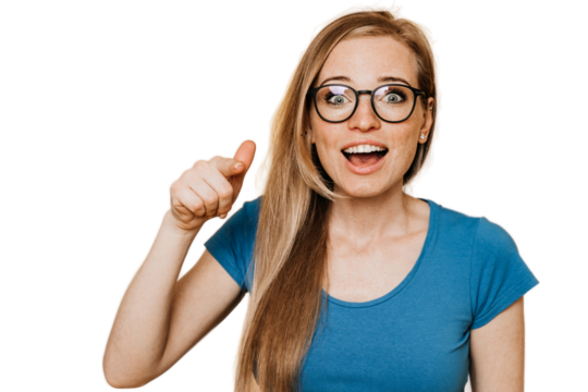 Close up portrait of cheerful excited young woman in glasses with open mouth, dressed in blue t-shirt, pointing finger at camera isolated on transparent background with copy space. Active people.