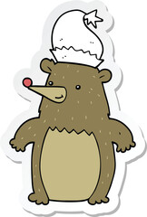 sticker of a cartoon bear wearing christmas hat
