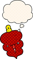 cartoon christmas decoration bauble and thought bubble in comic book style