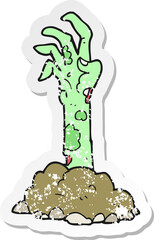retro distressed sticker of a cartoon zombie hand rising from ground