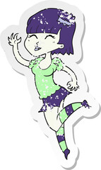 retro distressed sticker of a cartoon vampire girl