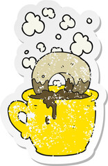 retro distressed sticker of a cartoon donut dunked in coffee
