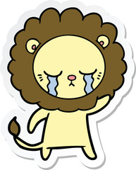 sticker of a crying cartoon lion