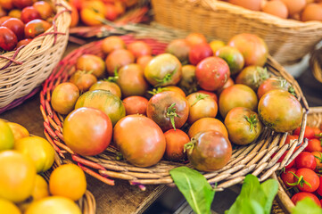 Tomatoes in a basket (market)