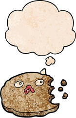cartoon cookie and thought bubble in grunge texture pattern style