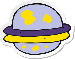 sticker of a cartoon alien planet