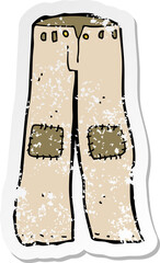 retro distressed sticker of a cartoon patched old pants