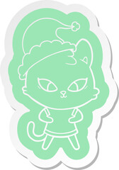 cute cartoon  sticker of a cat wearing santa hat