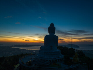 aerial photography scenery blue sky and blue ocean behind Phuket white big Buddha. Phuket white big Buddha is the .famous landmark in Phuket..Aerial panoramic view landscape Phuket big Buddha.