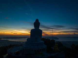 aerial photography scenery blue sky and blue ocean behind Phuket white big Buddha. Phuket white big Buddha is the .famous landmark in Phuket..Aerial panoramic view landscape Phuket big Buddha.